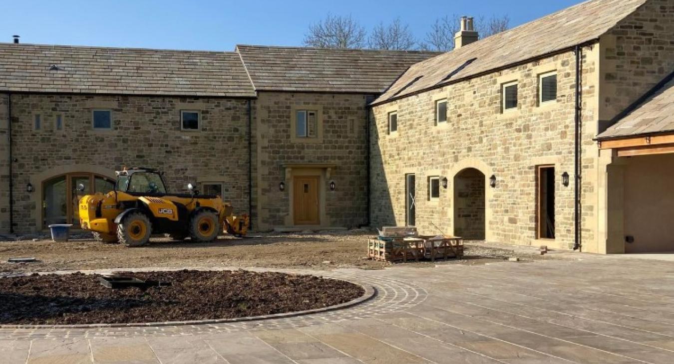 Why choose a local electrician for outdoor lighting installation in Meltham?